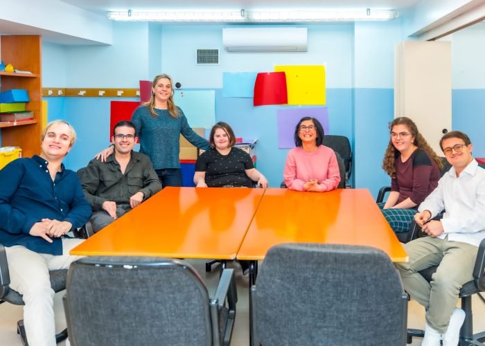 Group class photo portrait in a center for people with special needs